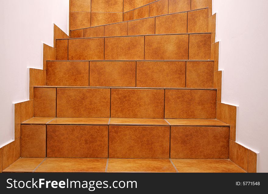 Stairway with brown floor tiles. Stairway with brown floor tiles