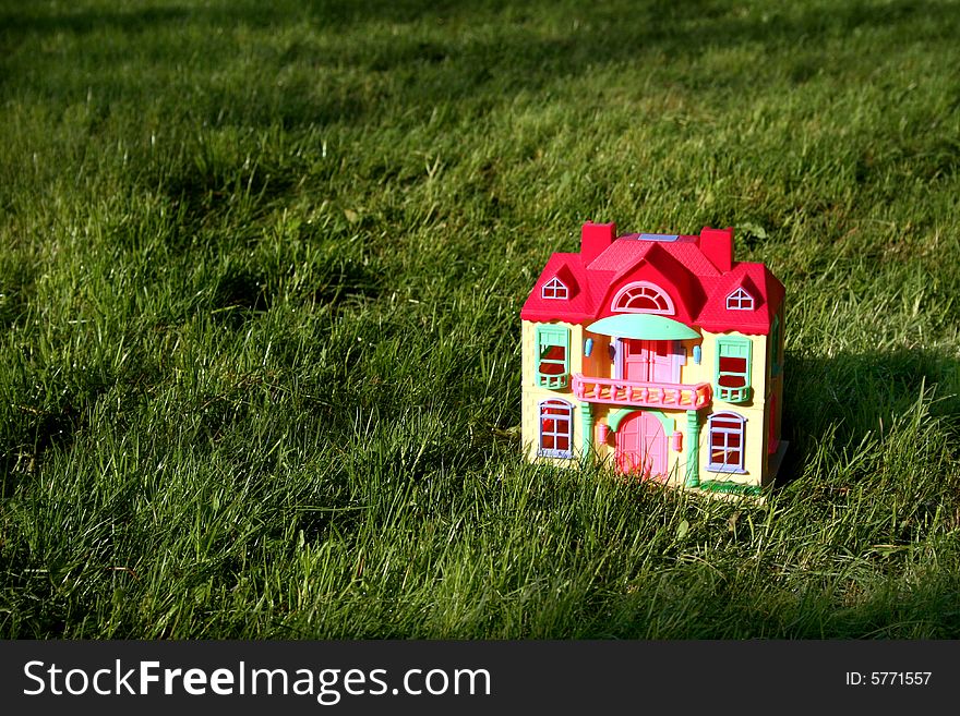 Miniature house on grass, still life. Miniature house on grass, still life
