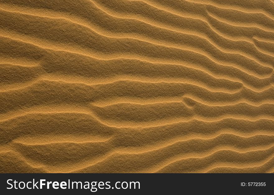 Lines of shadow and lignt on the yellow sand. Lines of shadow and lignt on the yellow sand