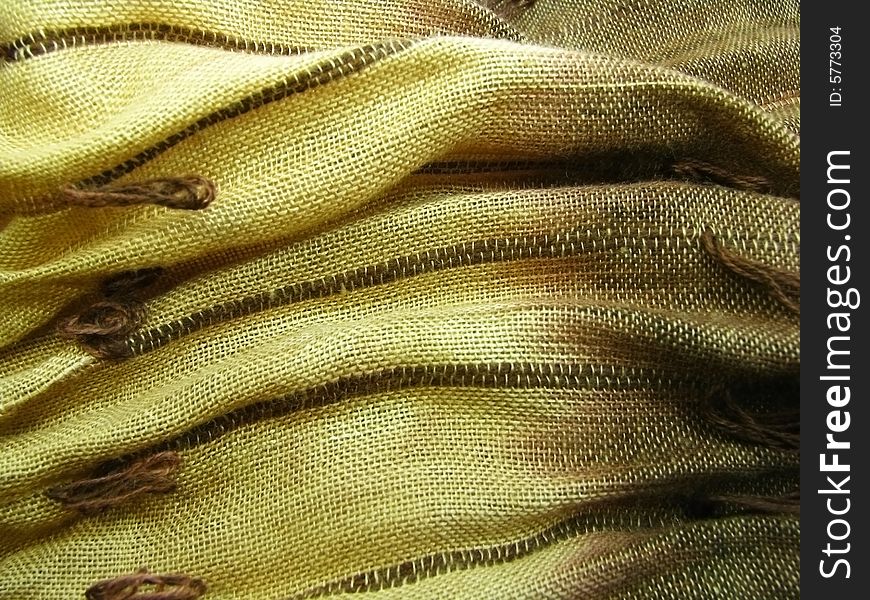 Textured image of a brown tex shawl