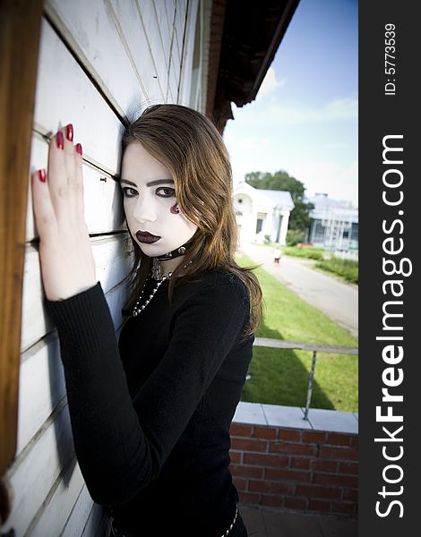 Beautiful Gothic Girl Near A Wall