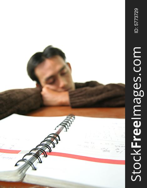 Book and sleeping man at background. Book and sleeping man at background