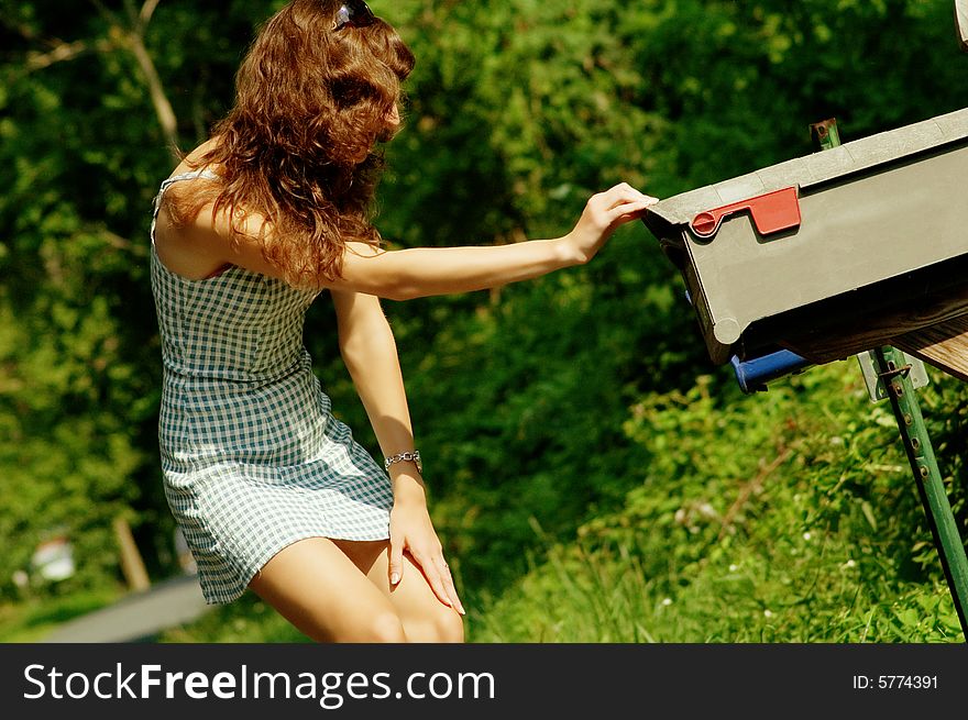 Girl Checking Mail