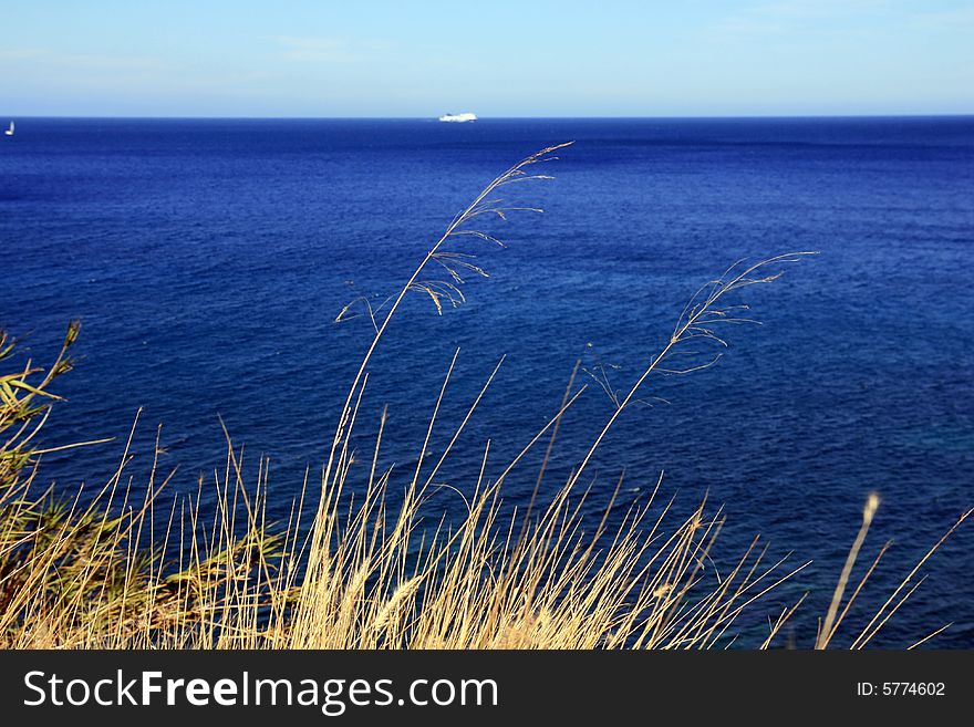 Seascape of blue mediterranean sea, a steep slope and coast. Italy electric. Seascape of blue mediterranean sea, a steep slope and coast. Italy electric