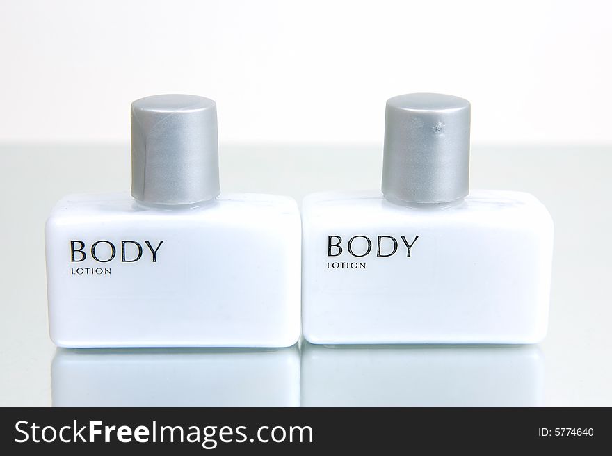 Hair and body products isolated against a white background