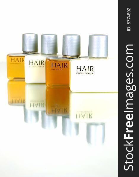 Hair and body products isolated against a white background