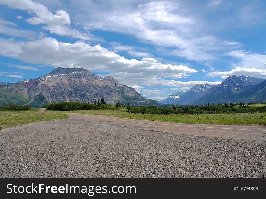 Landscape of mountains and road in waterton lake national park, alberta, canada. Landscape of mountains and road in waterton lake national park, alberta, canada