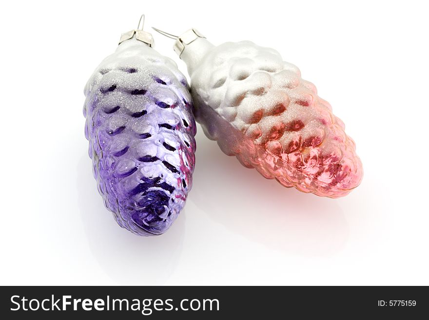 Christmas baubles: pine cones over white. Christmas baubles: pine cones over white