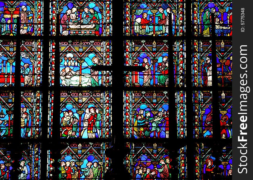 France, Paris: Notre Dame Our Lady is the most famous gothic cathedral. The construction is decorated with naturalist statues and stained-glass as those in the picture. France, Paris: Notre Dame Our Lady is the most famous gothic cathedral. The construction is decorated with naturalist statues and stained-glass as those in the picture