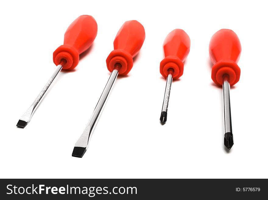 Set of steel screwdrivers on a white background