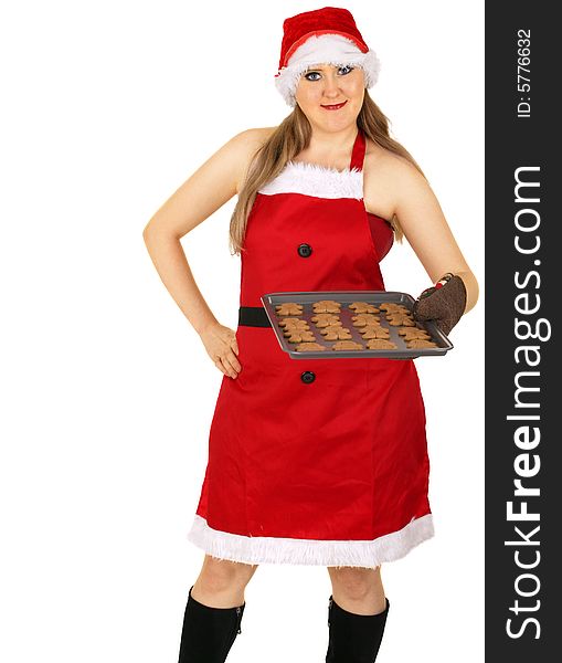 Mrs santa claus just finished baking gingerbread cookies. Mrs santa claus just finished baking gingerbread cookies