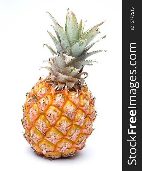 Fresh pineapple on a white background. Close up.