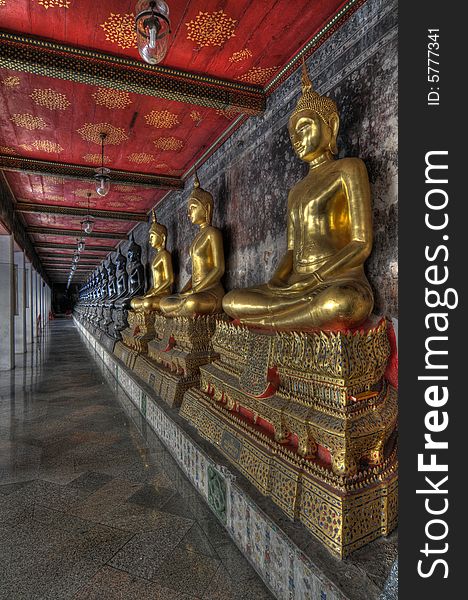 This is a HDR capture of the colonnade around the Viharn at Wat Suthat in Bangkok.