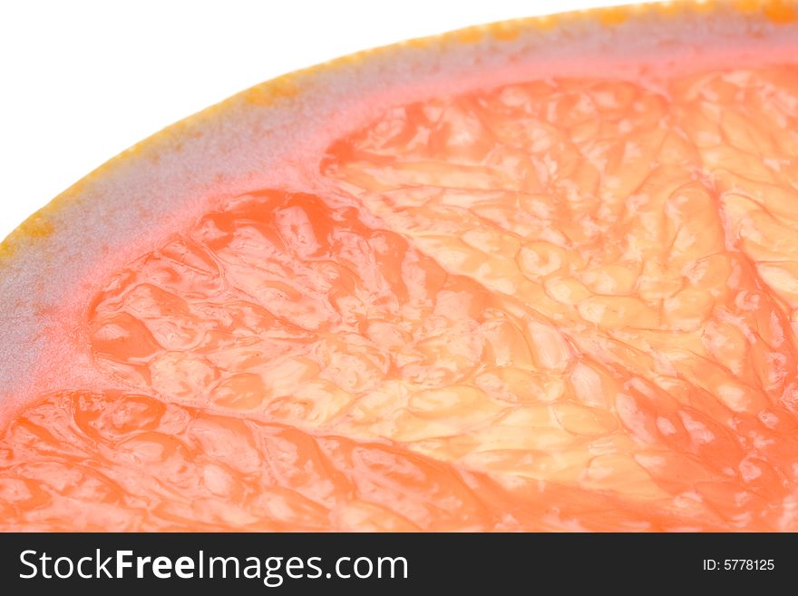 Fresh juicy grapefruit. Close up on a white background. Fresh juicy grapefruit. Close up on a white background.