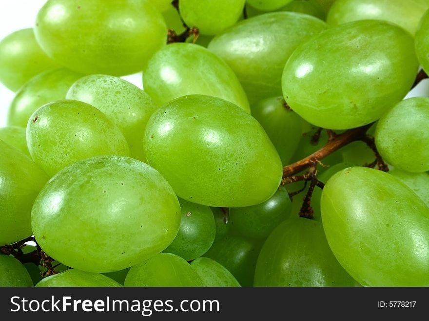 Green grapes isolated on white background