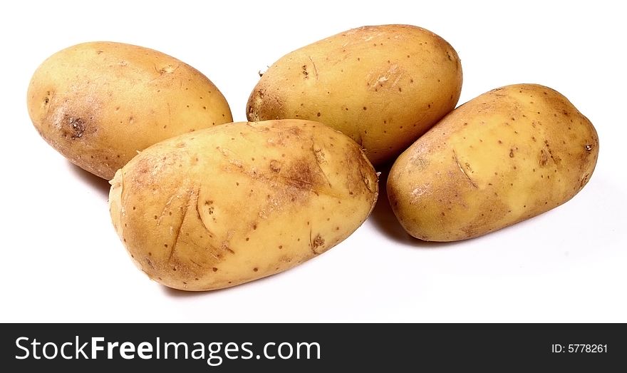 Potatoes on white background close up shoot