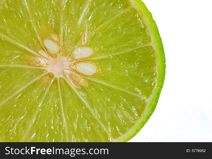 A close up of a cut lime. A close up of a cut lime.