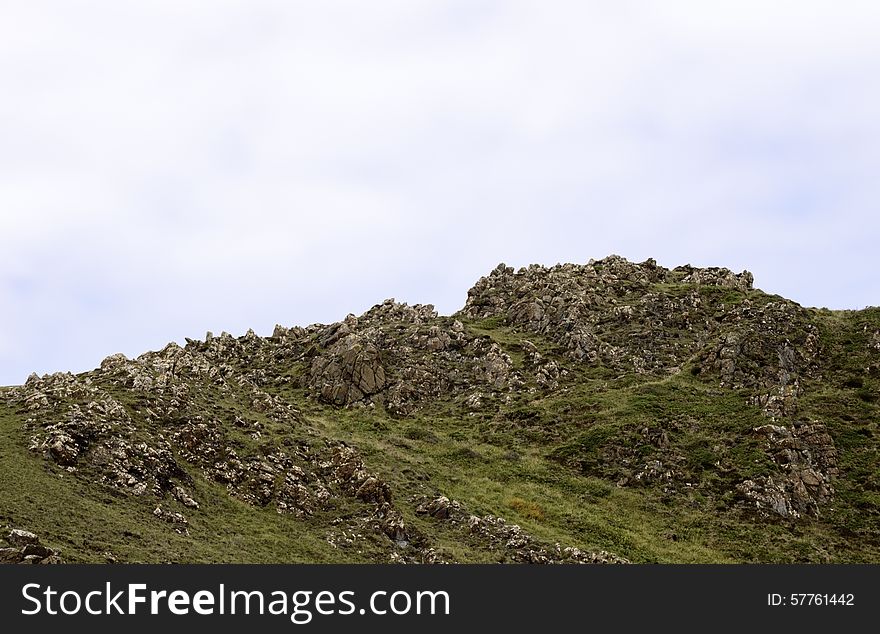 Cliff rock outcrops at Kyance Cove in Cornwall. One of the most beautiful places in the Lizard. Cliff rock outcrops at Kyance Cove in Cornwall. One of the most beautiful places in the Lizard