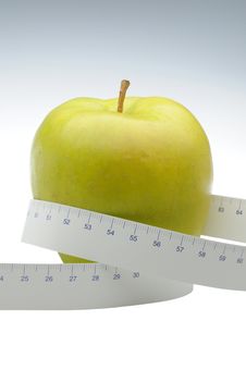 Green Apple With Measure Tape Royalty Free Stock Photos Green Apple With Measure Tape Royalty Free Stock Photos