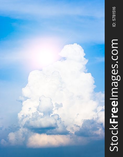 Blue sky with clouds and sun for background