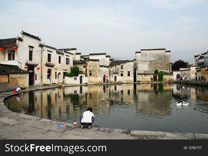 Hongcun, the world culture heritage of Anhui old villages of China, the tradition of Anhui civil houses are black tiles plus white brick walls. Nice comparison. Yue Zhao (moon lake) is in the middle of the village. Hongcun, the world culture heritage of Anhui old villages of China, the tradition of Anhui civil houses are black tiles plus white brick walls. Nice comparison. Yue Zhao (moon lake) is in the middle of the village.