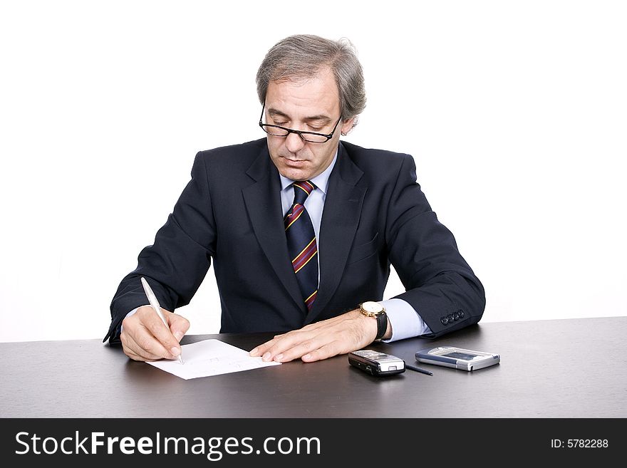 Mature businessman working, isolated over white background