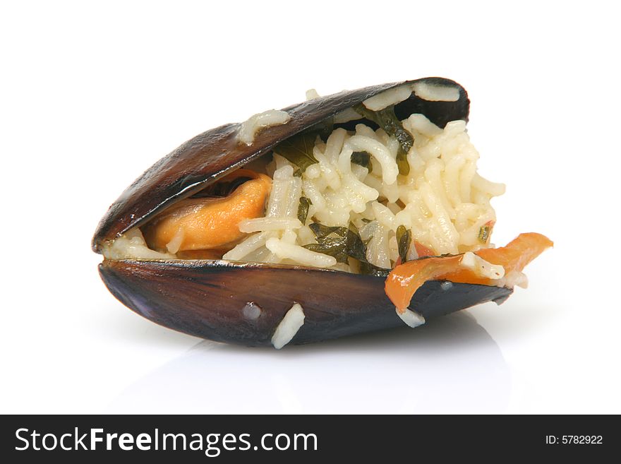 Gourmet closeup mussels cooked with rice isolated on white background. Gourmet closeup mussels cooked with rice isolated on white background