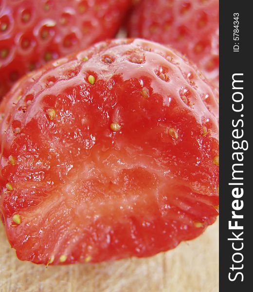 Juicy, shiny bitten strawberries isolated on kitchen wooden board, other strawberries in the background

*RAW format available. Juicy, shiny bitten strawberries isolated on kitchen wooden board, other strawberries in the background

*RAW format available