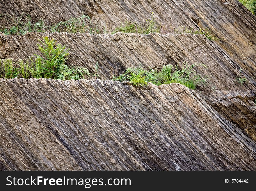Structure of rock in Prague. Background texture. Structure of rock in Prague. Background texture.