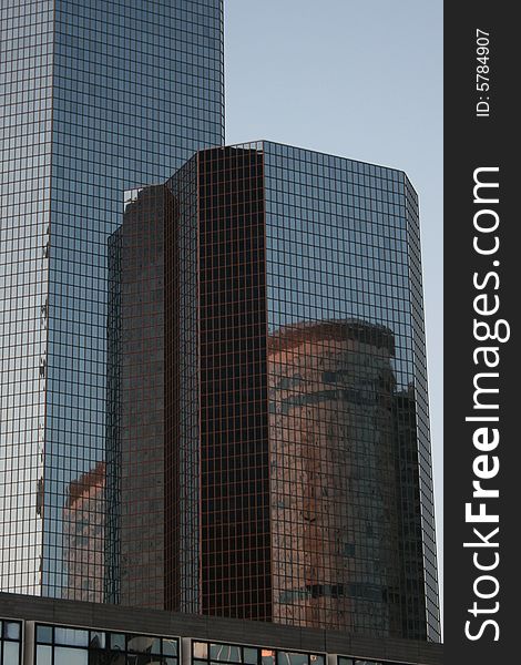 Building and reflect at evening in Paris La Defense, France