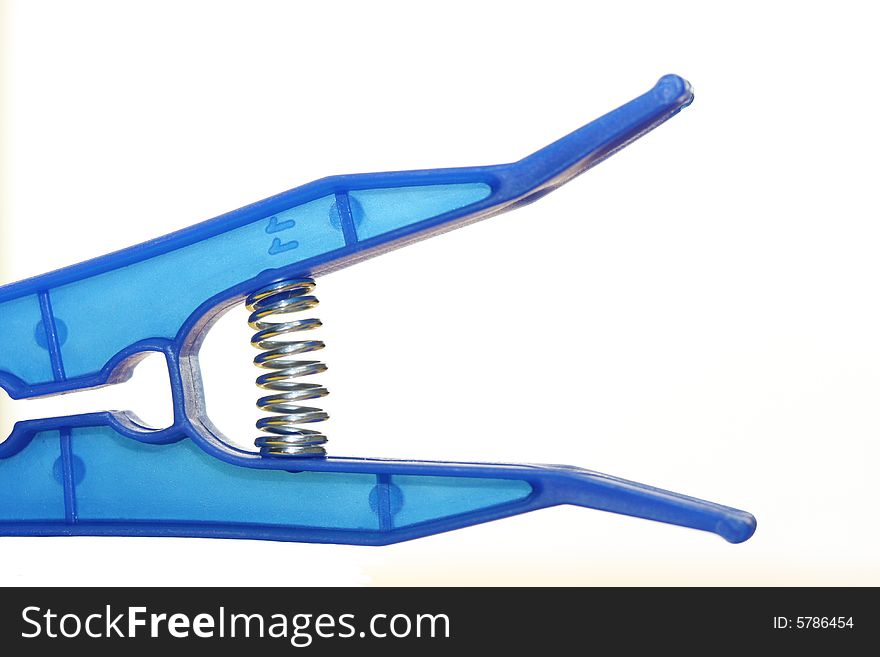Blue plastic clothes peg isolated