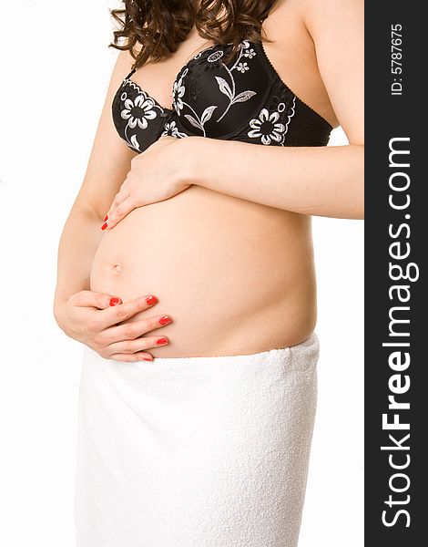 Pregnant woman holding her  belly