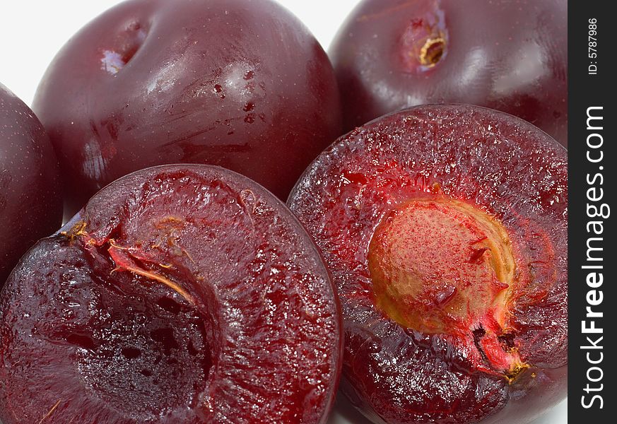 Pulp of red plums close up isolated