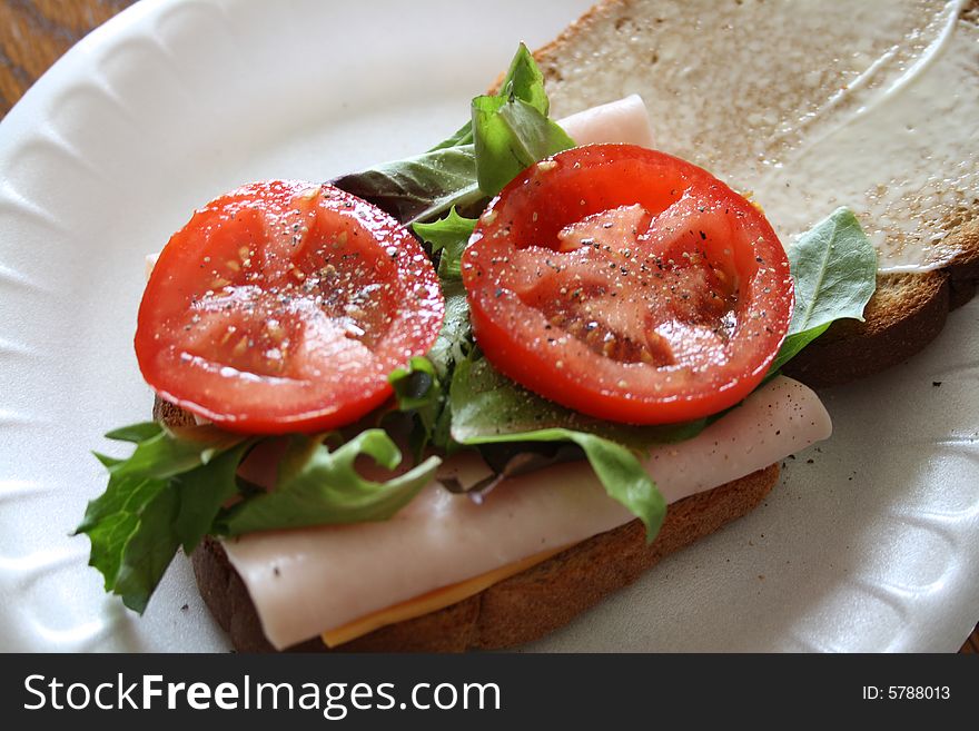 Healthy ham sandwich with lettuce and tomatoes. Healthy ham sandwich with lettuce and tomatoes