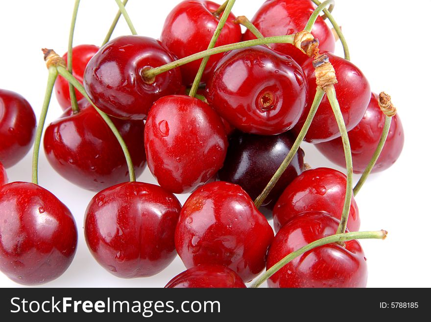 Delicious sweet cherry fruit on white background