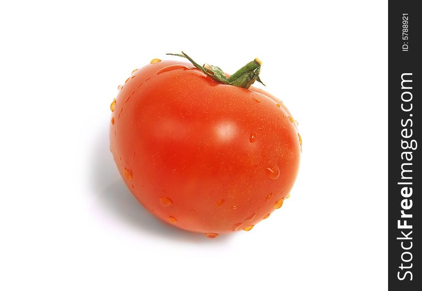 Single fresh red tomato with water drops and isolated on white background. Single fresh red tomato with water drops and isolated on white background