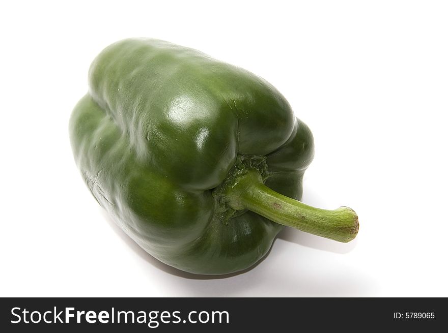 Green bell pepper isolated on white