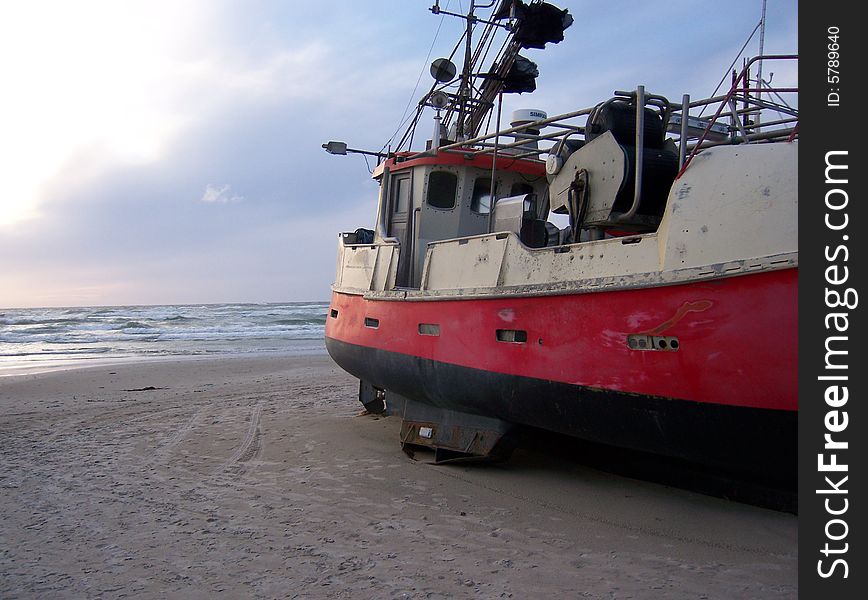 Fisherboat lying on a beach. Fisherboat lying on a beach