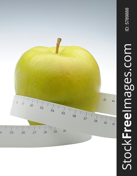 Green Apple With Measure Tape