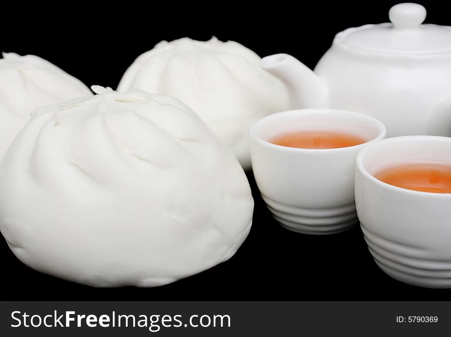 Chinese Barbecued Pork Bun With Teapot And Teacups