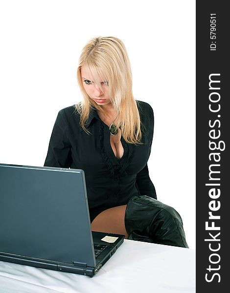 Cute lady in black with a laptop over white. Cute lady in black with a laptop over white