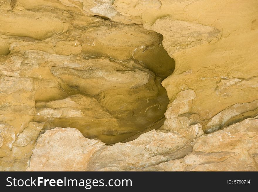 A cliff of striated sandstone.