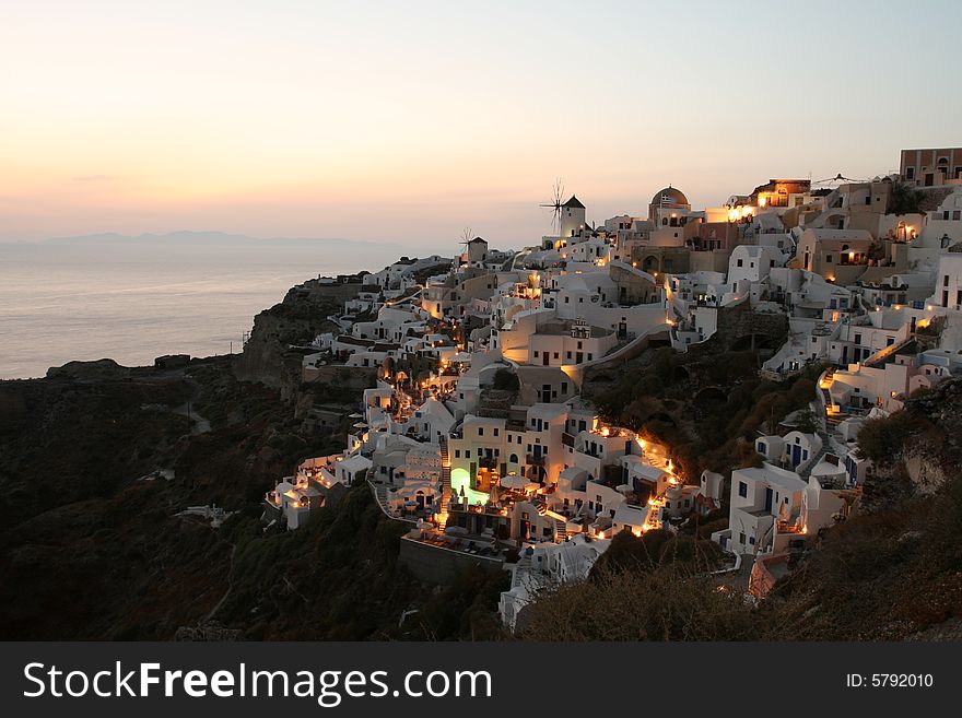 Views of stunning village overlooking Mediterranean sea at sunset. Views of stunning village overlooking Mediterranean sea at sunset.