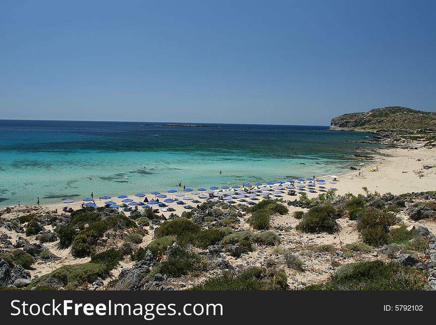 Beautiful sand beach on the coast of Crete, Greece. Beautiful sand beach on the coast of Crete, Greece.