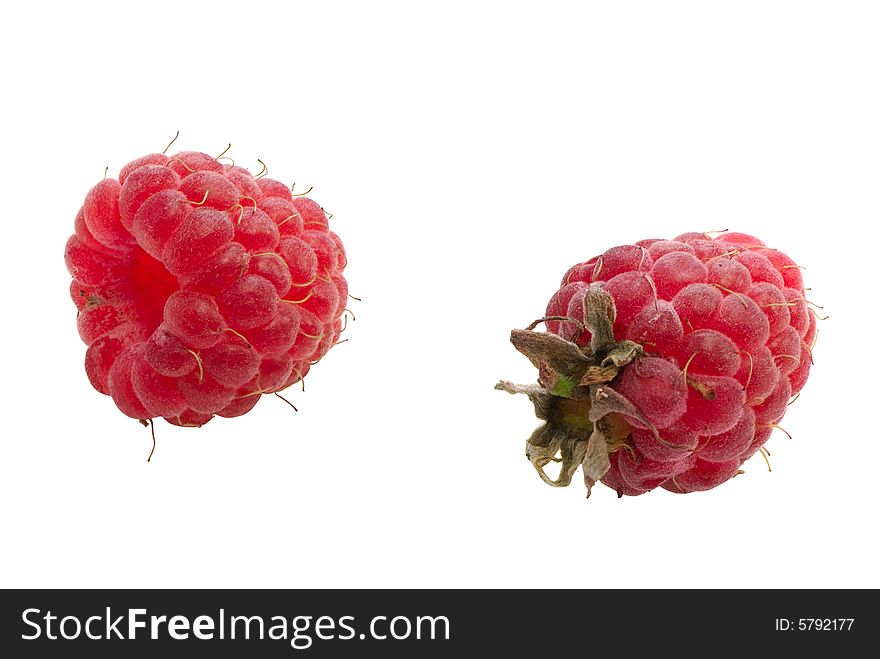 Fruits of a ripe raspberry on a white background