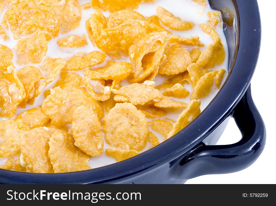 A bowl of cornflakes with milk - healthy diet