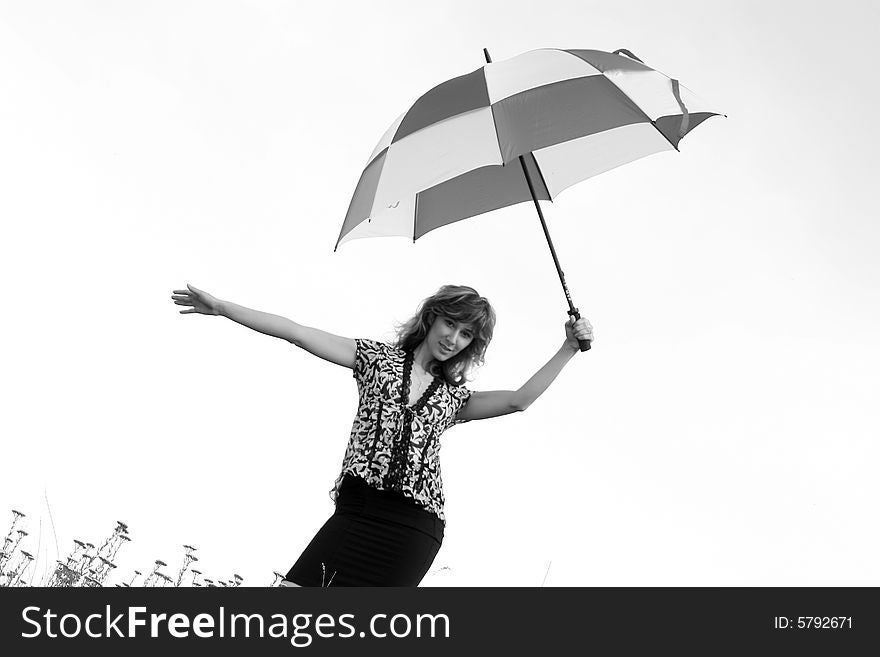 A beautiful girl and an umbrella. A beautiful girl and an umbrella