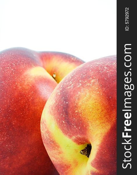 Isolated photo of two big fresh nectarines