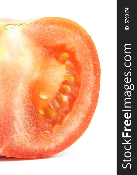 Isolated macro photo of cut of a tomato