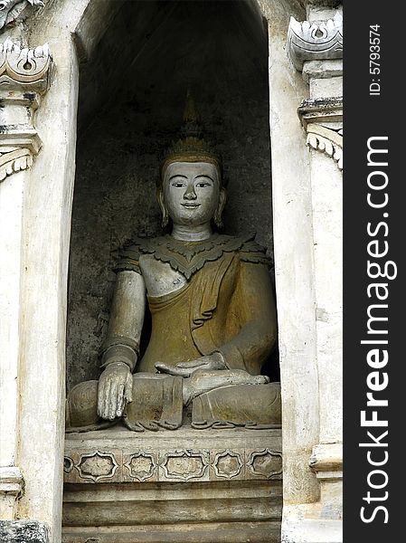 Thailand, Chiang Mai: seated Buddha at wat Chedi Liem the main temple of the city situated along the Ping River. Thailand, Chiang Mai: seated Buddha at wat Chedi Liem the main temple of the city situated along the Ping River